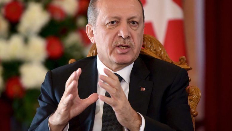 Turkish counterpart Recep Tayyip Erdogan is pictured during a joint press conference with Latvian President during Erdogan's visit to Riga, Latvia on October 23, 2014. Erdogan is in Latvia for the official visit. AFP PHOTO / ILMARS ZNOTINSILMARS ZNOTINS/AFP/Getty Images