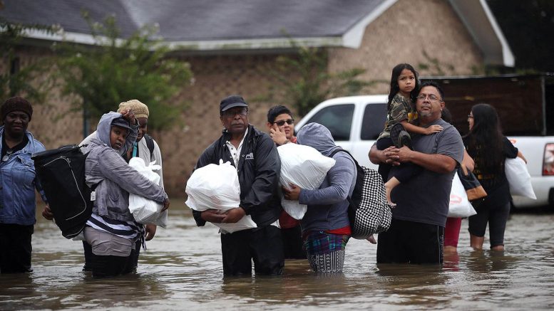 Harvey moves into Louisiana with at least 35 dead, 17 missing