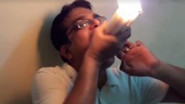 Mumbai man holds 22 LIT CANDLES in mouth; creates Guinness World Record